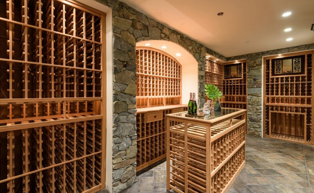 The lower level has it all- large wine tasting room, climate-controlled wine cellar, and a gym with sauna.