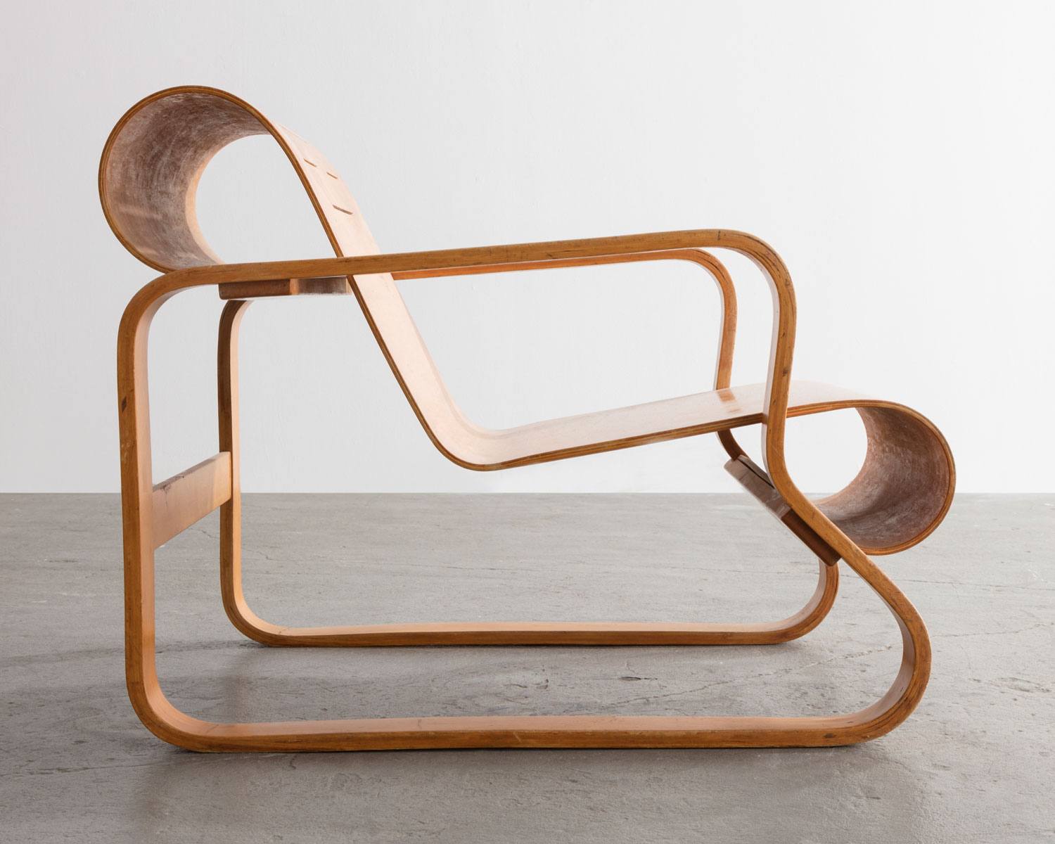 A chair designed by Alvar Aalto.
