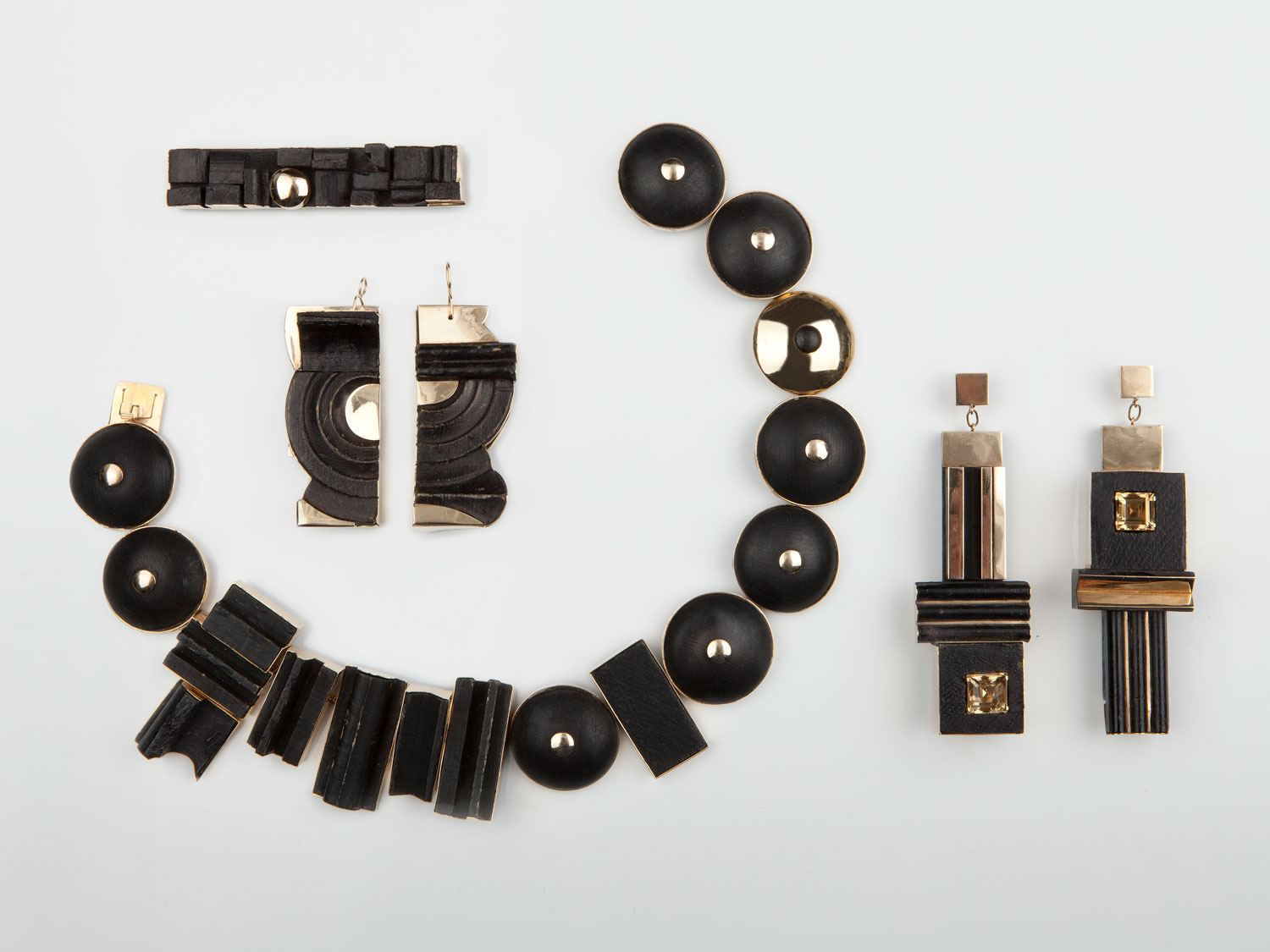 Four black-painted wood and 14-karat gold jewels made by Nevelson in circa 1965: a bar brooch, necklace, and two pairs of earrings, including one with citrines. The other pair of earrings (shown left) was featured on the cover of the catalogue for the Museum of Modern Art’s 1967 travelling exhibition, Jewelry by Contemporary Painters and Sculptors.