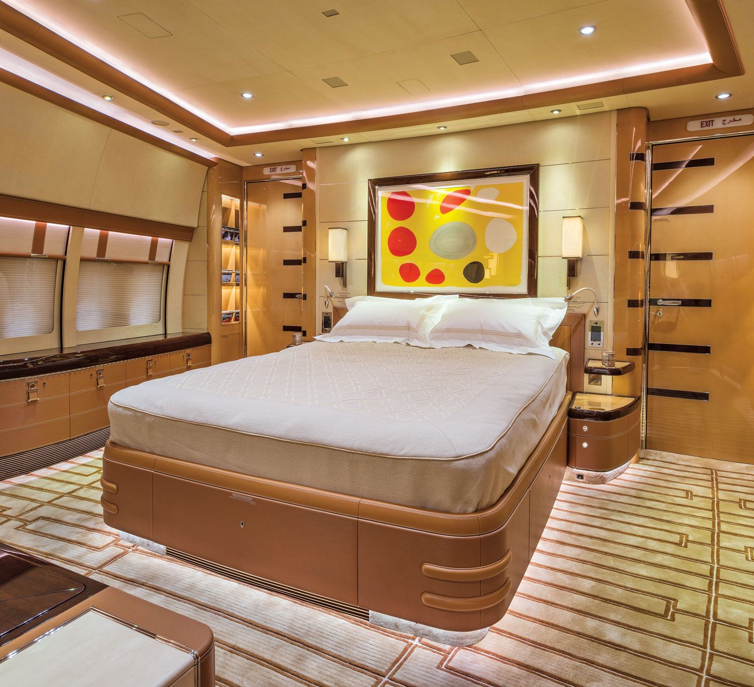 In the master bedroom of the private Boeing 747-8, an etching by Alexander Calder hangs above an Alberto Pinto-designed embossed leather bed with a saddle-stitch detail.
