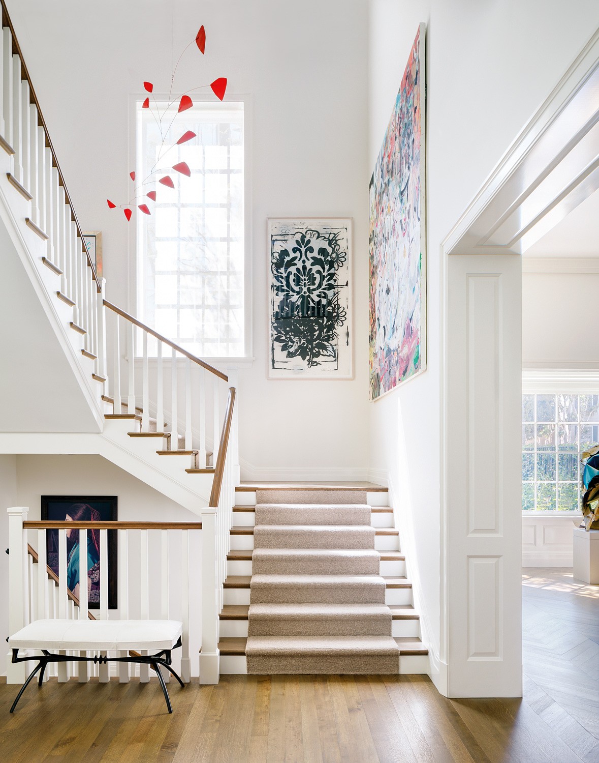A Calder mobile suspends over a staircase in a La Jolla home designed by Madeline Stuart.